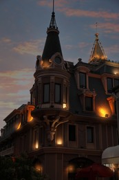 Beautiful old building with illumination in evening