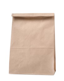 Photo of Closed kraft paper bag isolated on white