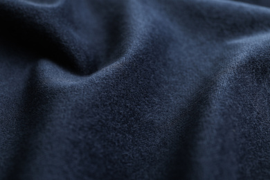 Photo of Texture of dark blue fabric as background, closeup