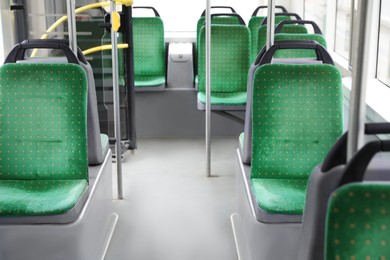 Photo of Public transport interior with comfortable green seats