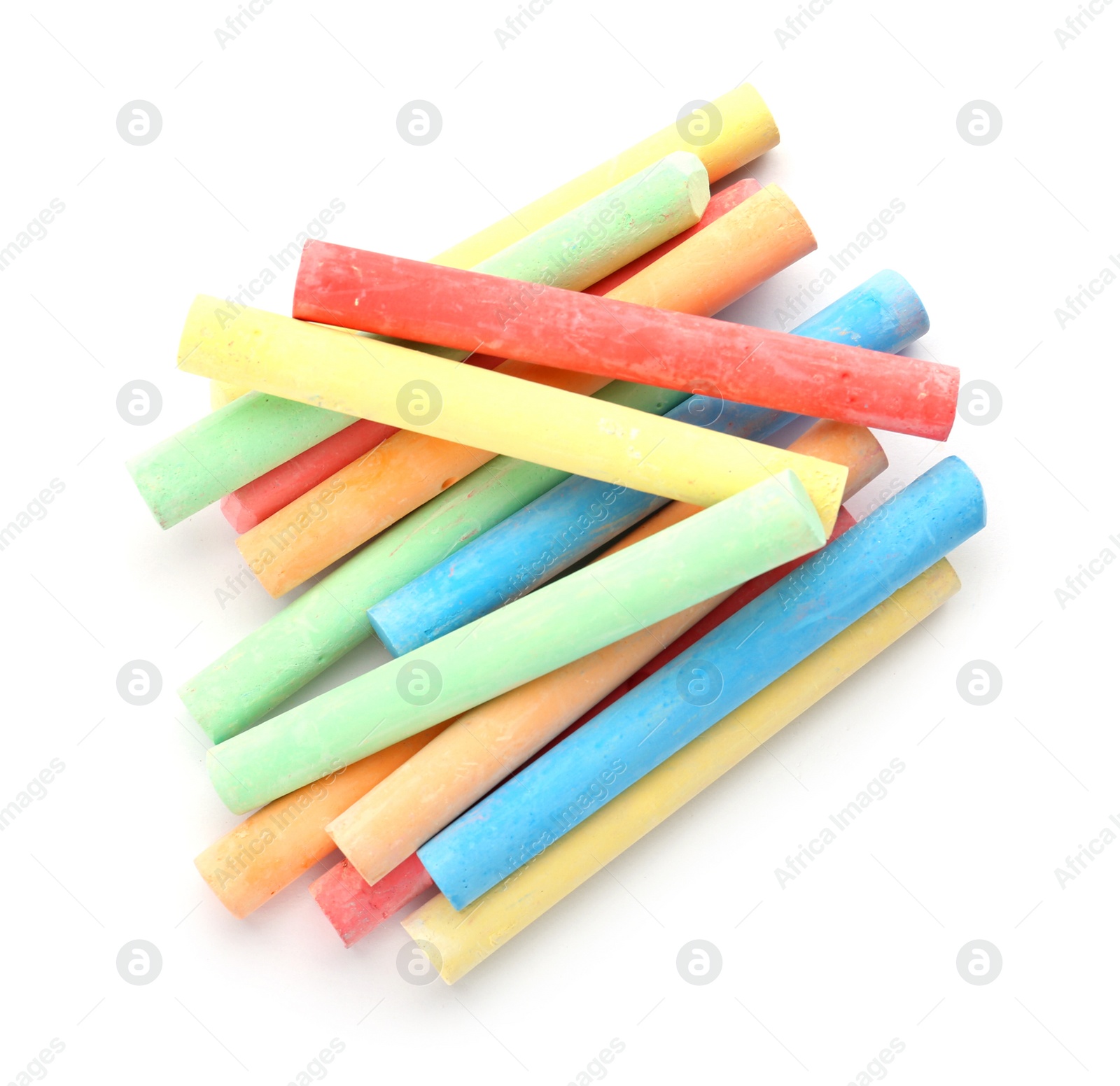 Photo of Color pieces of chalk on white background