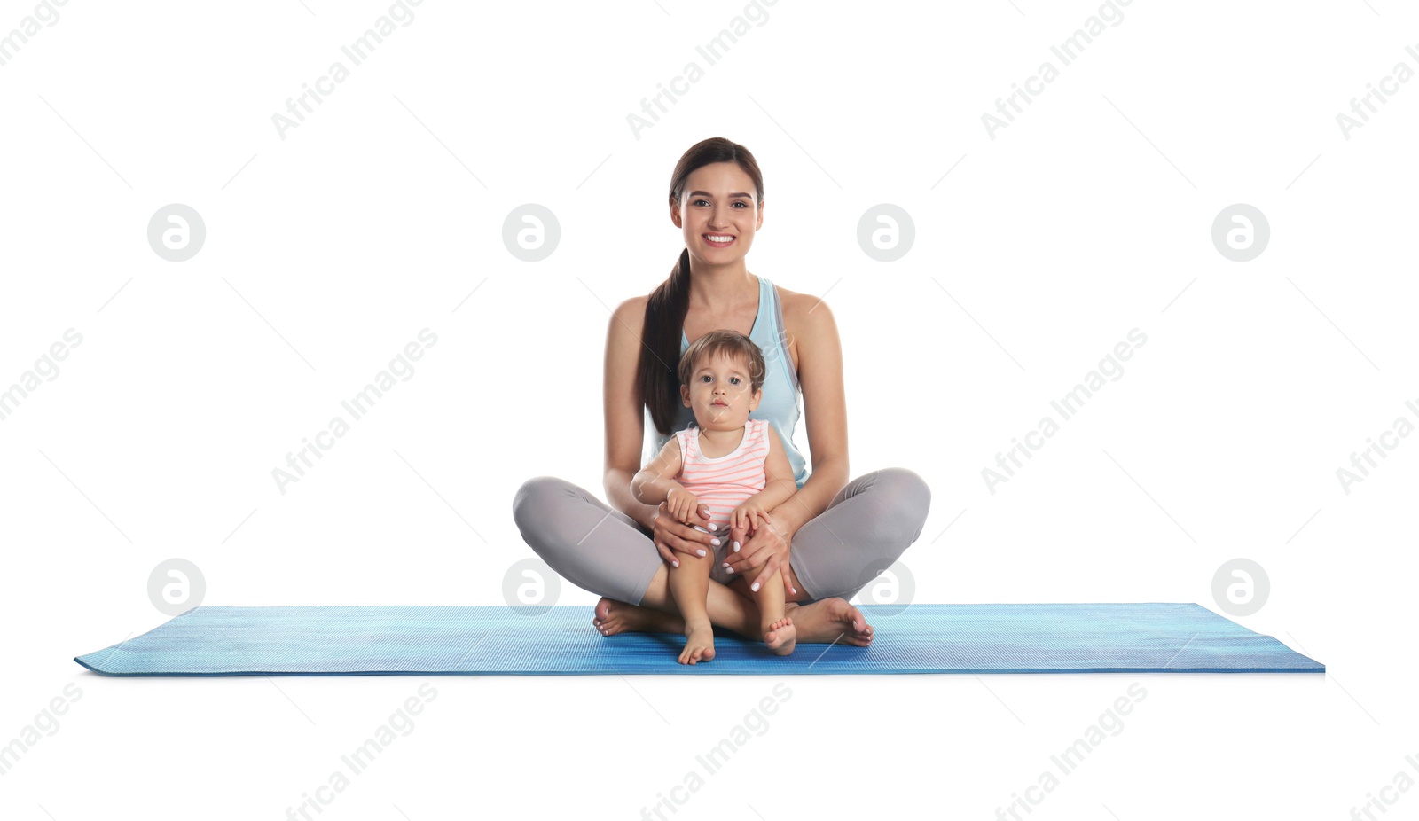 Photo of Young woman meditating with her son isolated on white