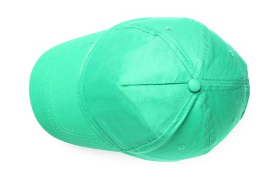 Photo of Stylish green baseball cap on white background, top view