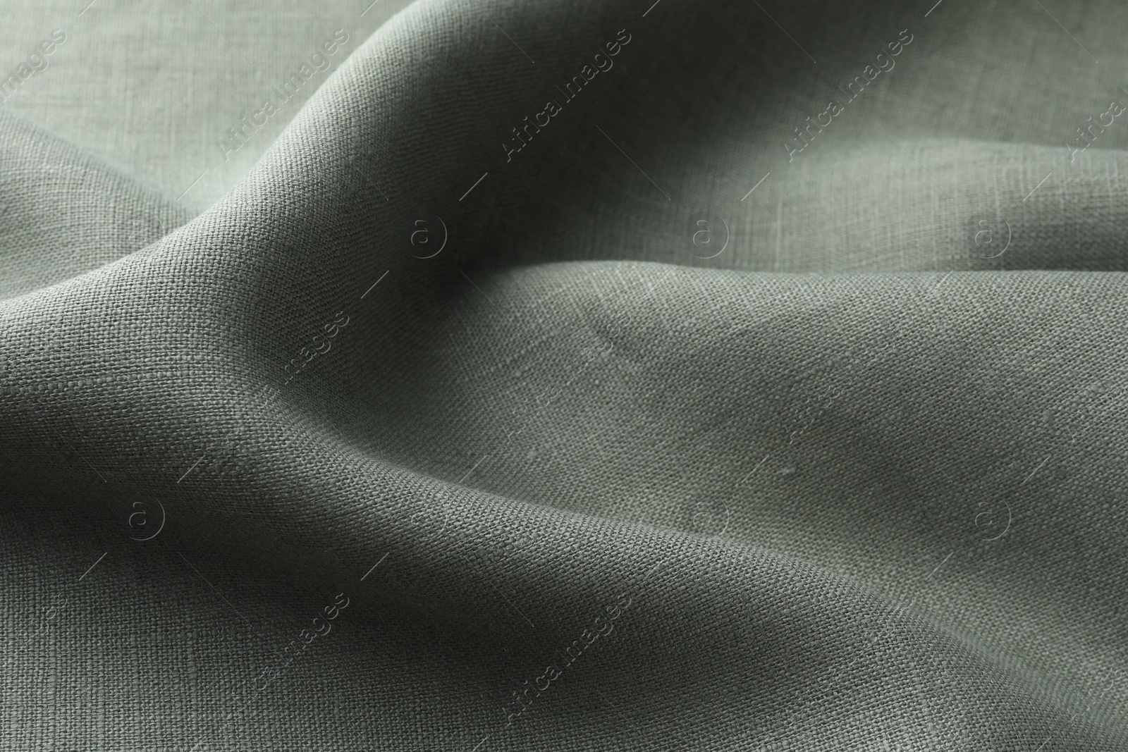 Photo of Texture of grey crumpled fabric as background, closeup