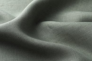 Photo of Texture of grey crumpled fabric as background, closeup