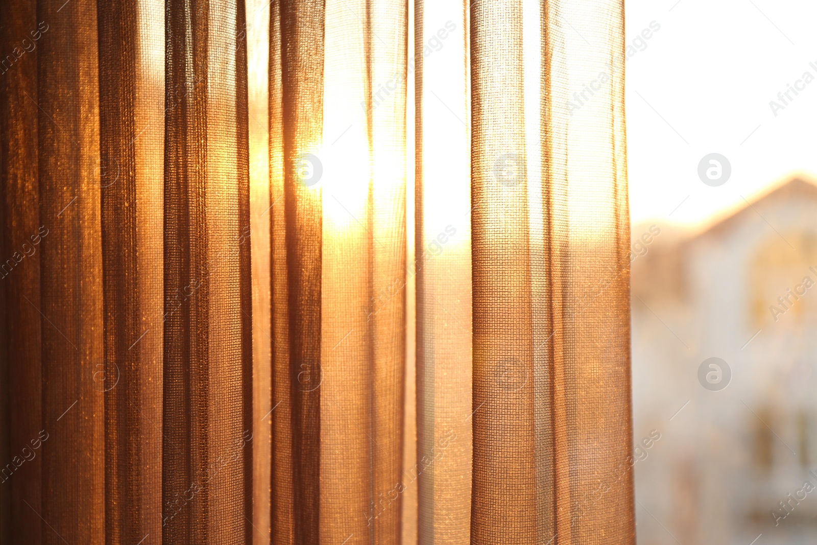 Photo of Window with beautiful transparent curtain, closeup view