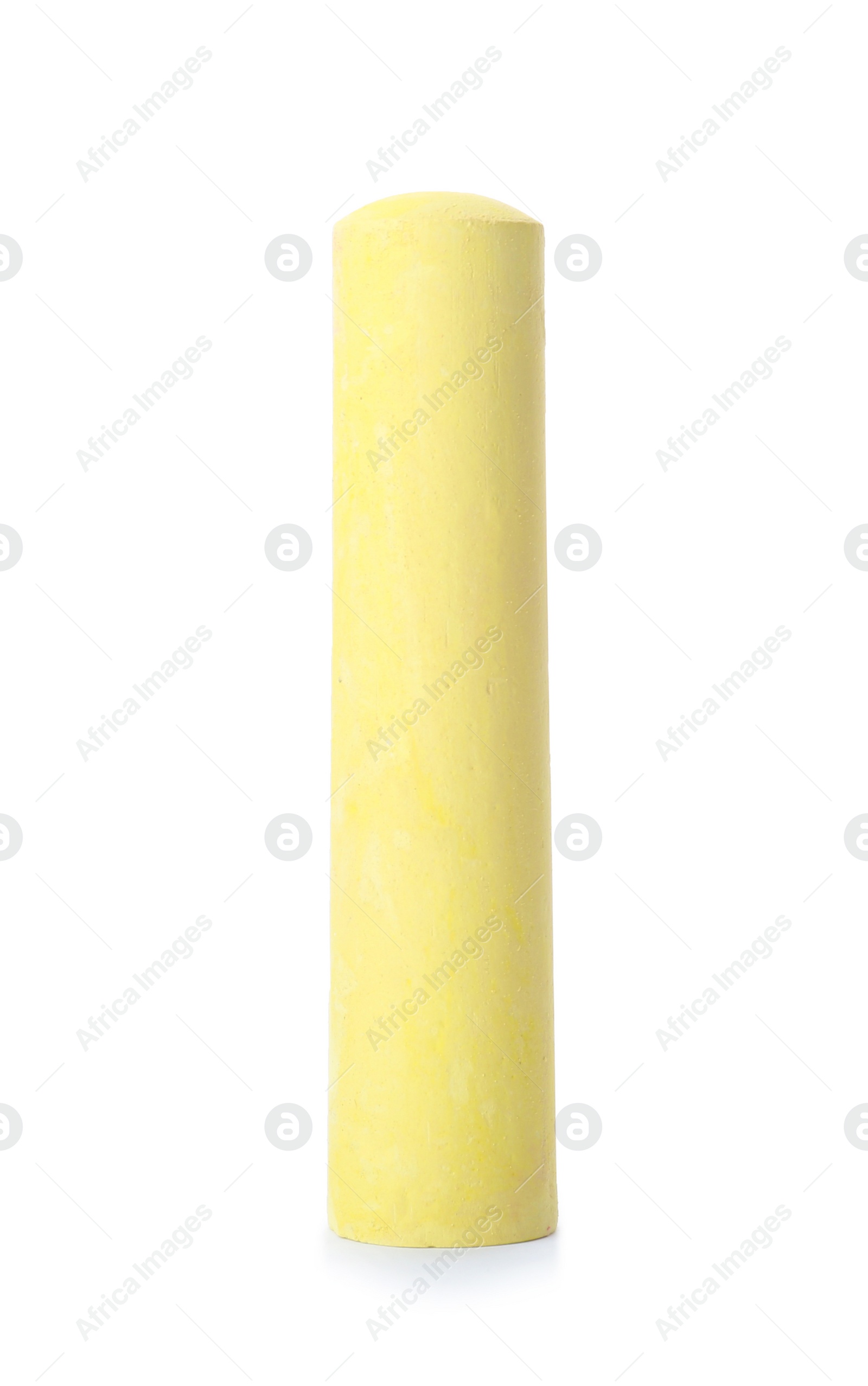 Photo of Yellow piece of chalk on white background