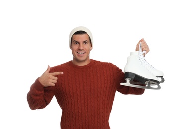 Happy man with ice skates on white background