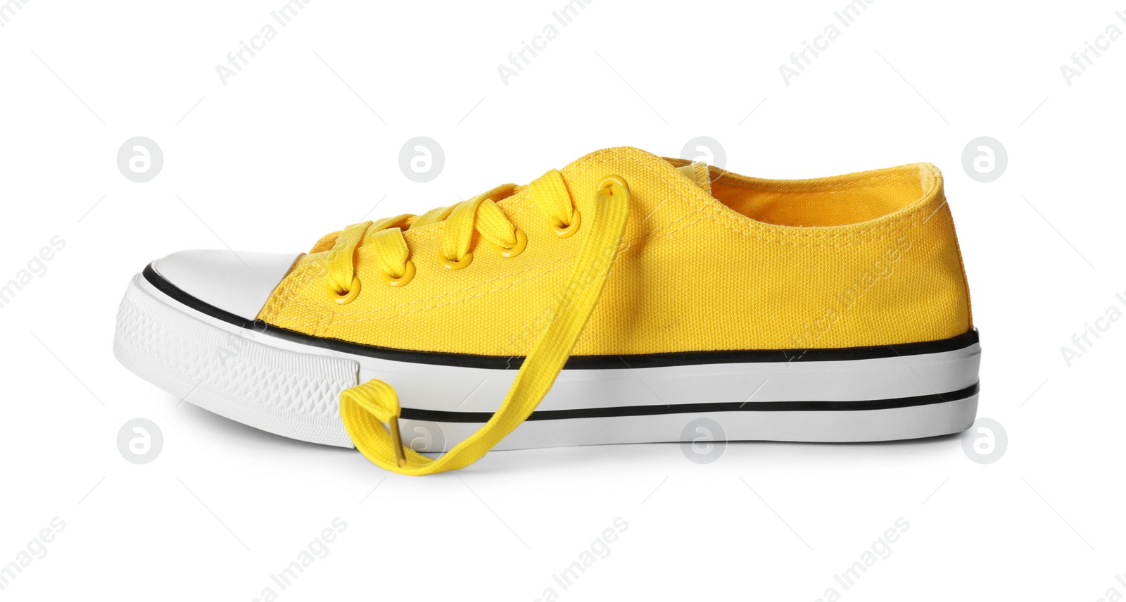 Photo of One sneaker isolated on white. Trendy shoes