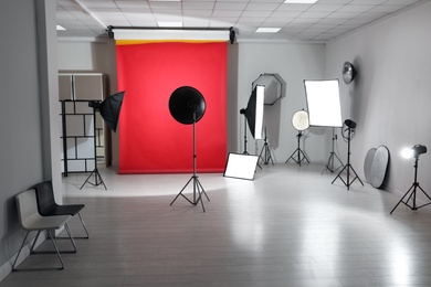 Interior of modern photo studio with professional equipment