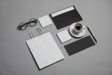 Composition with stationery on grey background. Mock up for design