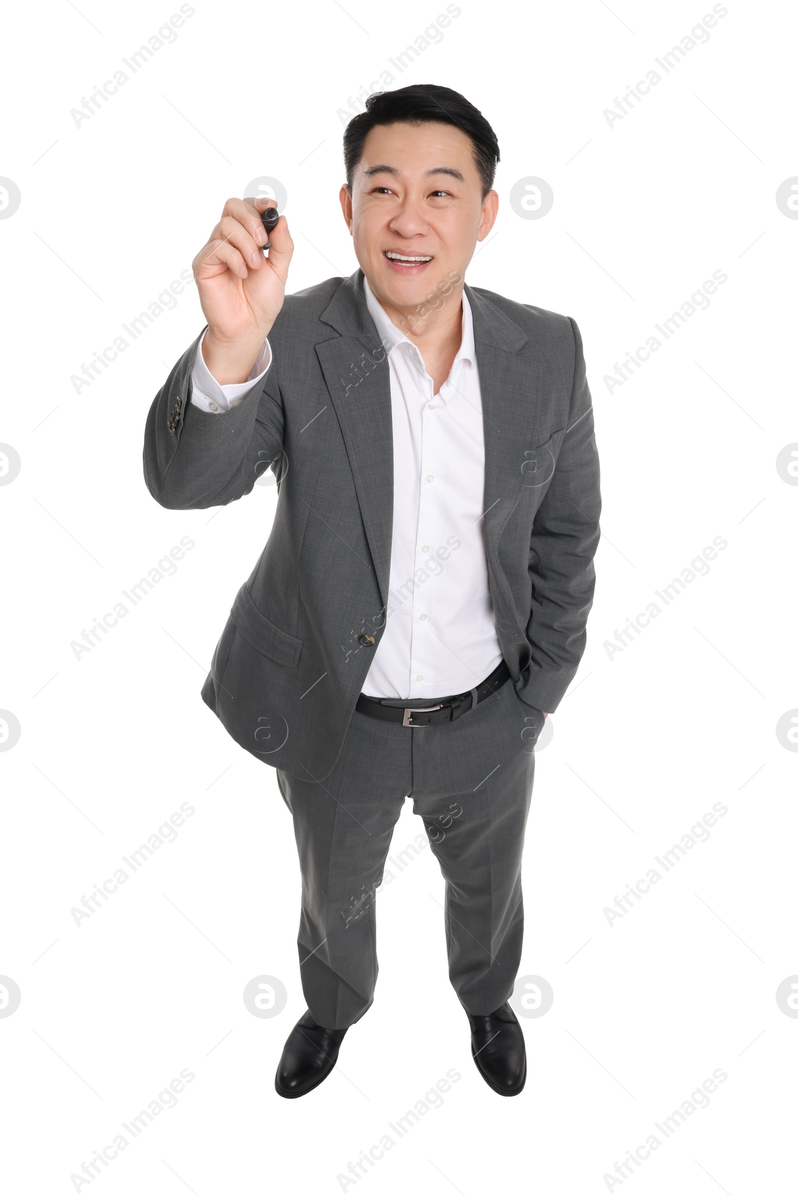 Photo of Businessman in suit with marker writing on white background, above view