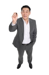 Photo of Businessman in suit with marker writing on white background, above view