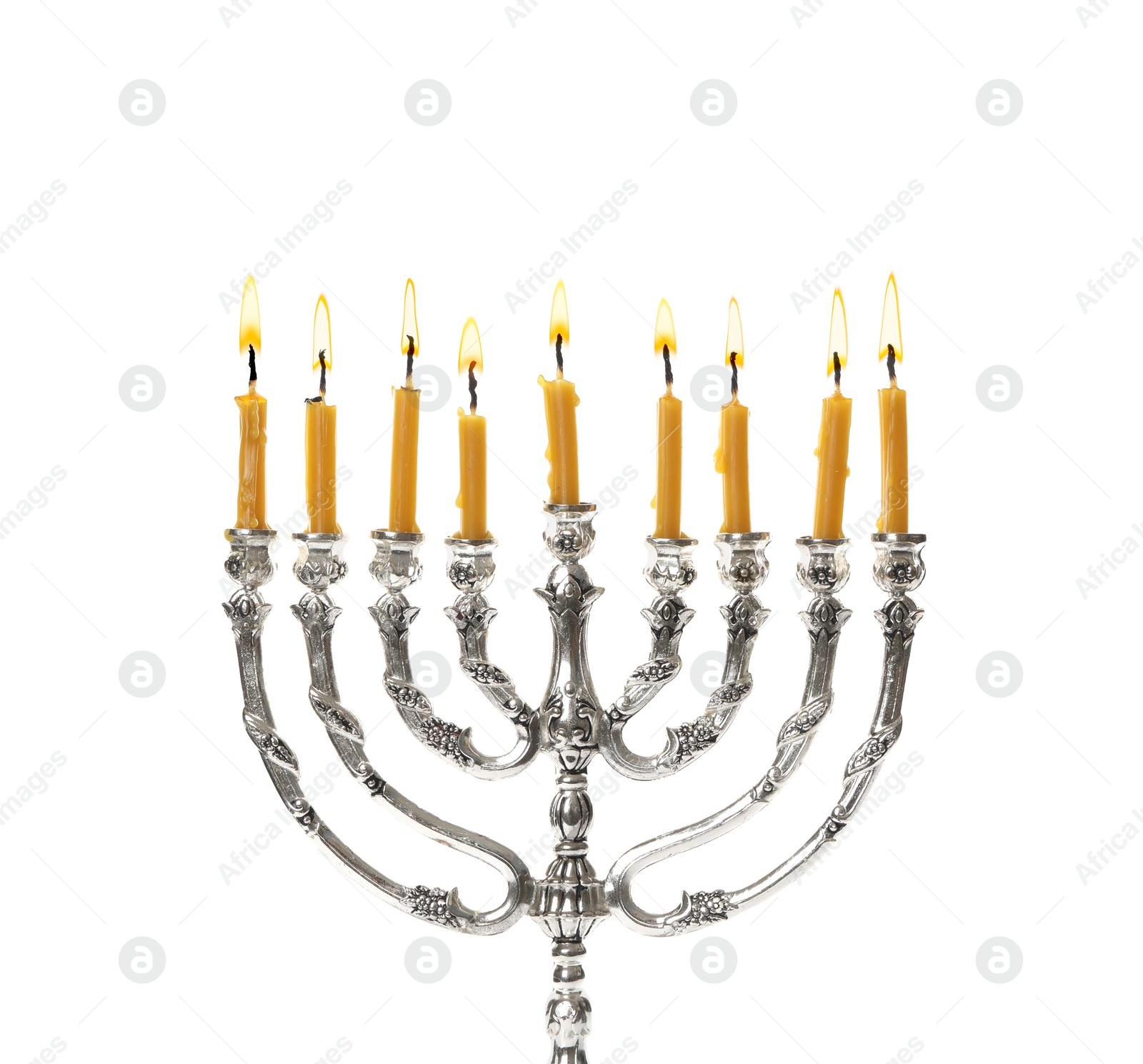 Photo of Silver menorah with burning candles on white background. Hanukkah celebration