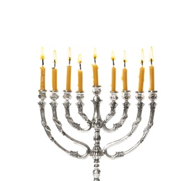 Photo of Silver menorah with burning candles on white background. Hanukkah celebration