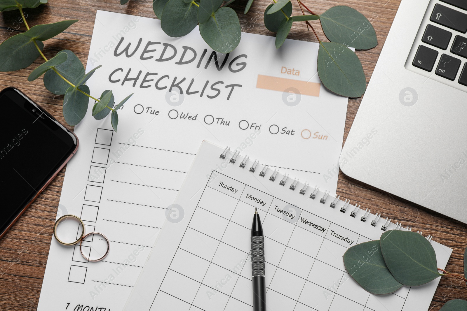 Photo of Flat lay composition with Wedding Checklist and calendar on wooden table