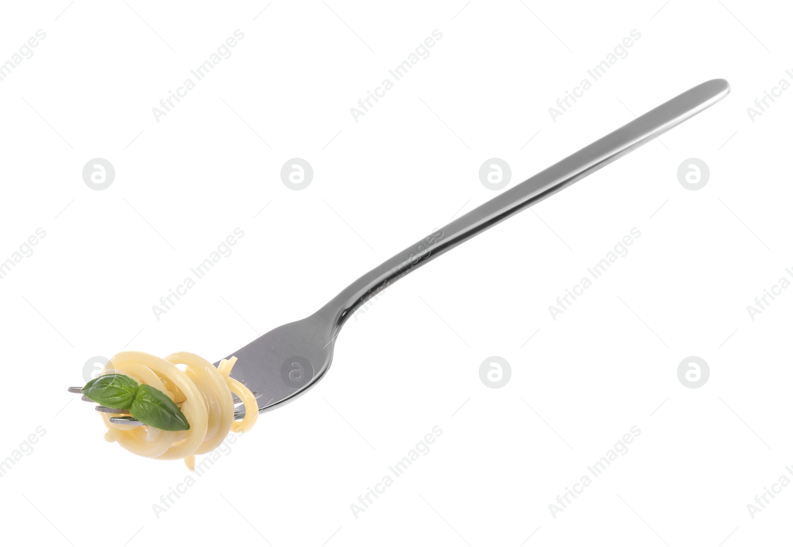 Photo of Fork with tasty pasta and basil isolated on white