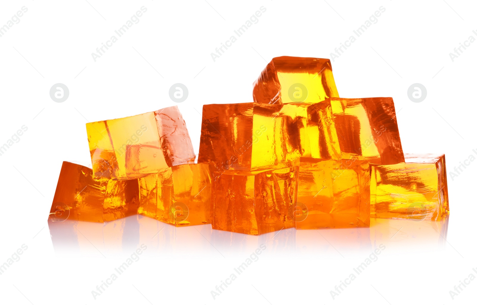 Photo of Pile of tasty jelly cubes isolated on white