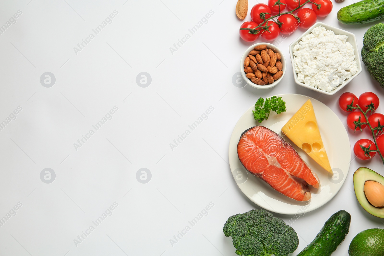 Photo of Different products and space for text on white background, flat lay. Keto diet