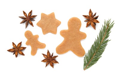 Photo of Unbaked Christmas cookies, anise and fir tree twig on white background, top view