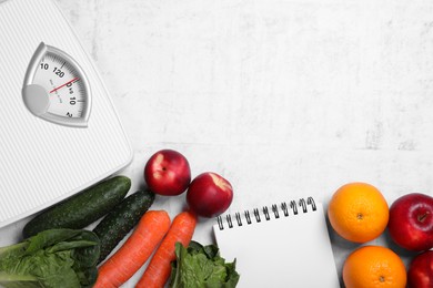 Photo of Scales, notebook, fresh fruits and vegetables on light gray textured table, flat lay with space for text. Low glycemic index diet