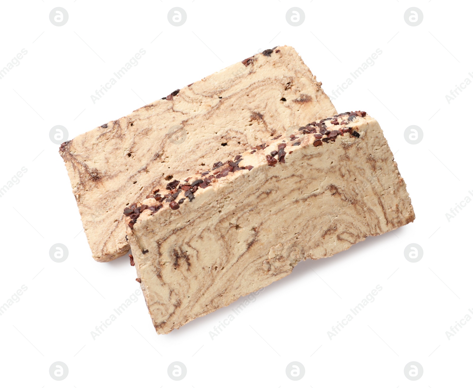 Photo of Pieces of tasty chocolate halva isolated on white, top view