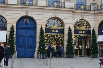 Paris, France - December 10, 2022: Christian Dior store exterior with Christmas decor