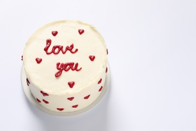 Bento cake with text Love You on white table, space for text. St. Valentine's day surprise