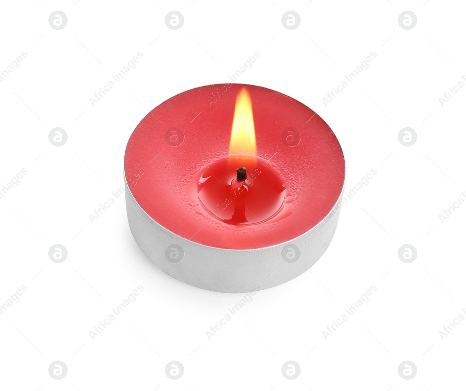 Photo of Colorful wax candle burning on white background
