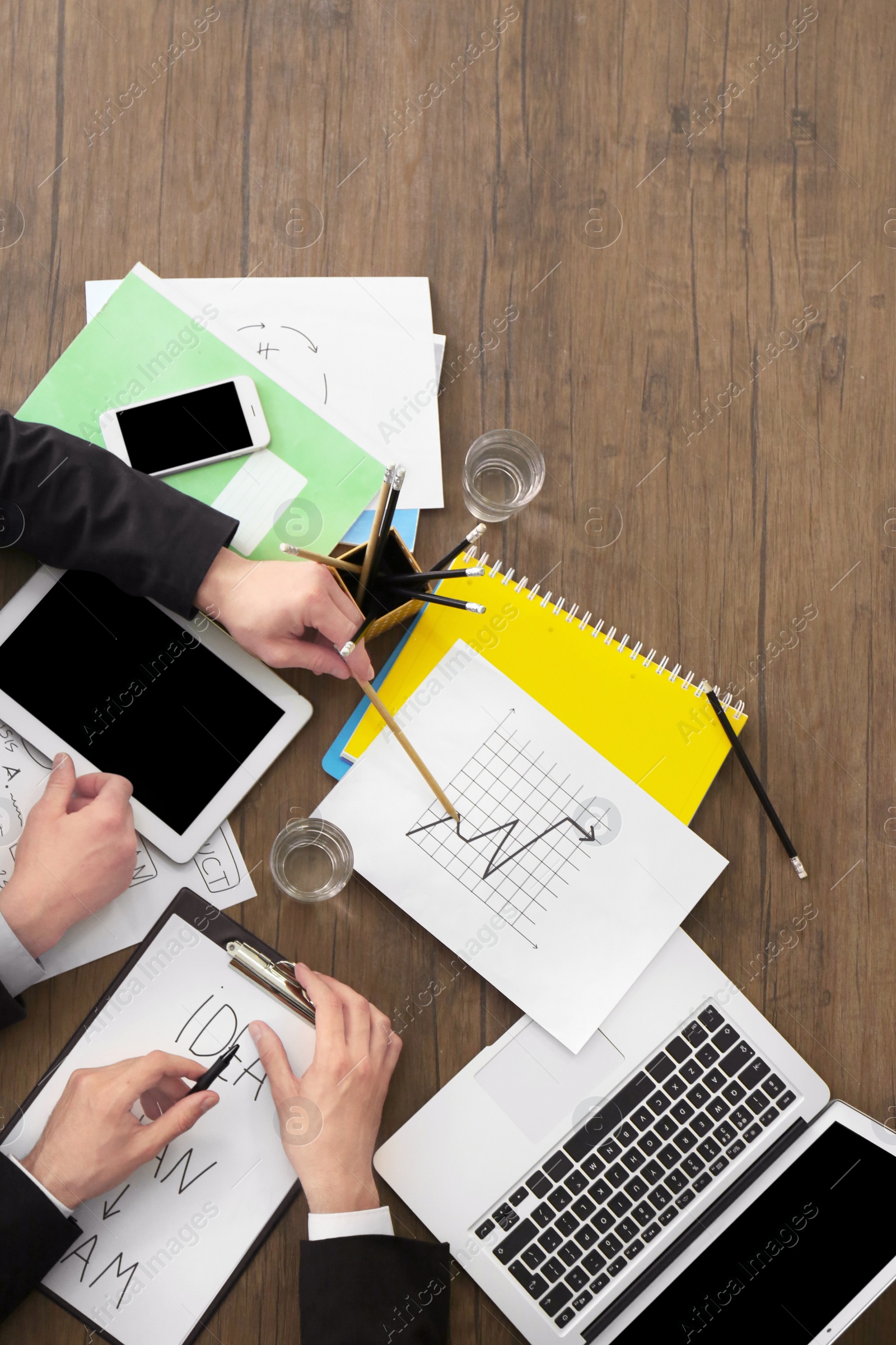 Photo of Business trainer and client working in office, closeup