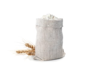 Photo of Sack with flour and wheat spikes on white background