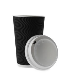 Photo of Takeaway paper coffee cup and lid isolated on white