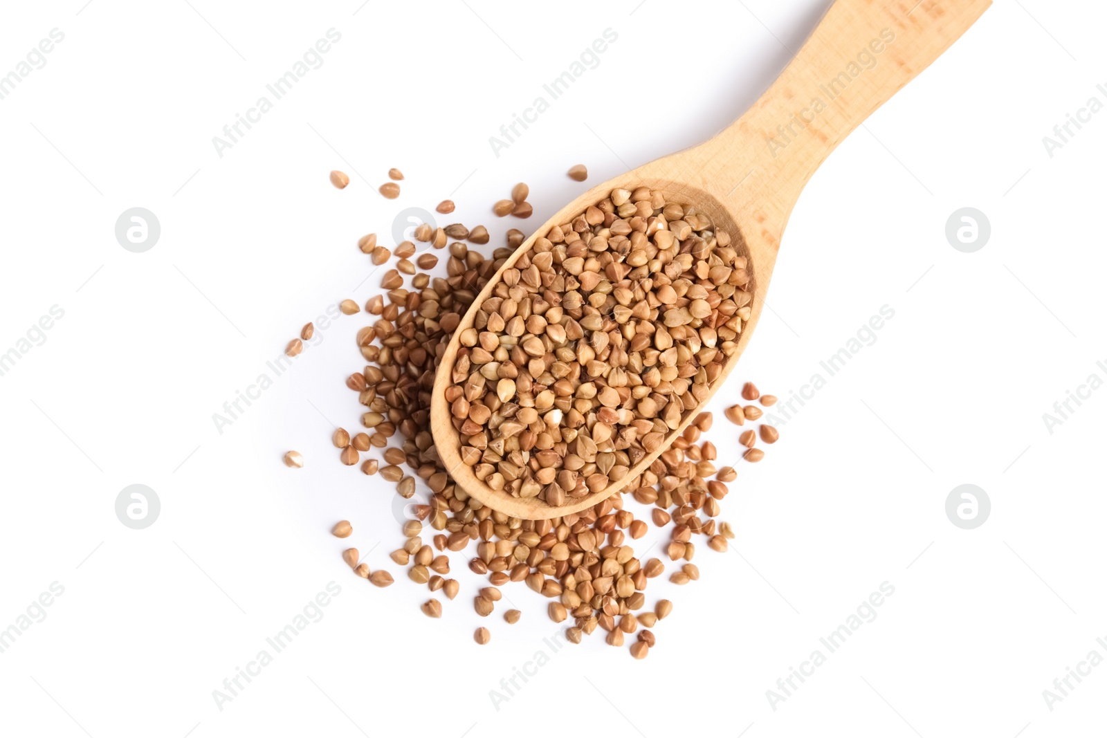 Photo of Spoon with uncooked buckwheat on white background, top view