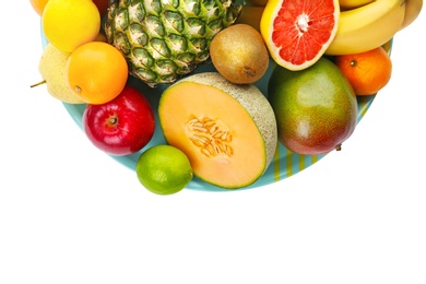 Photo of Plate with fresh tropical fruits on white background