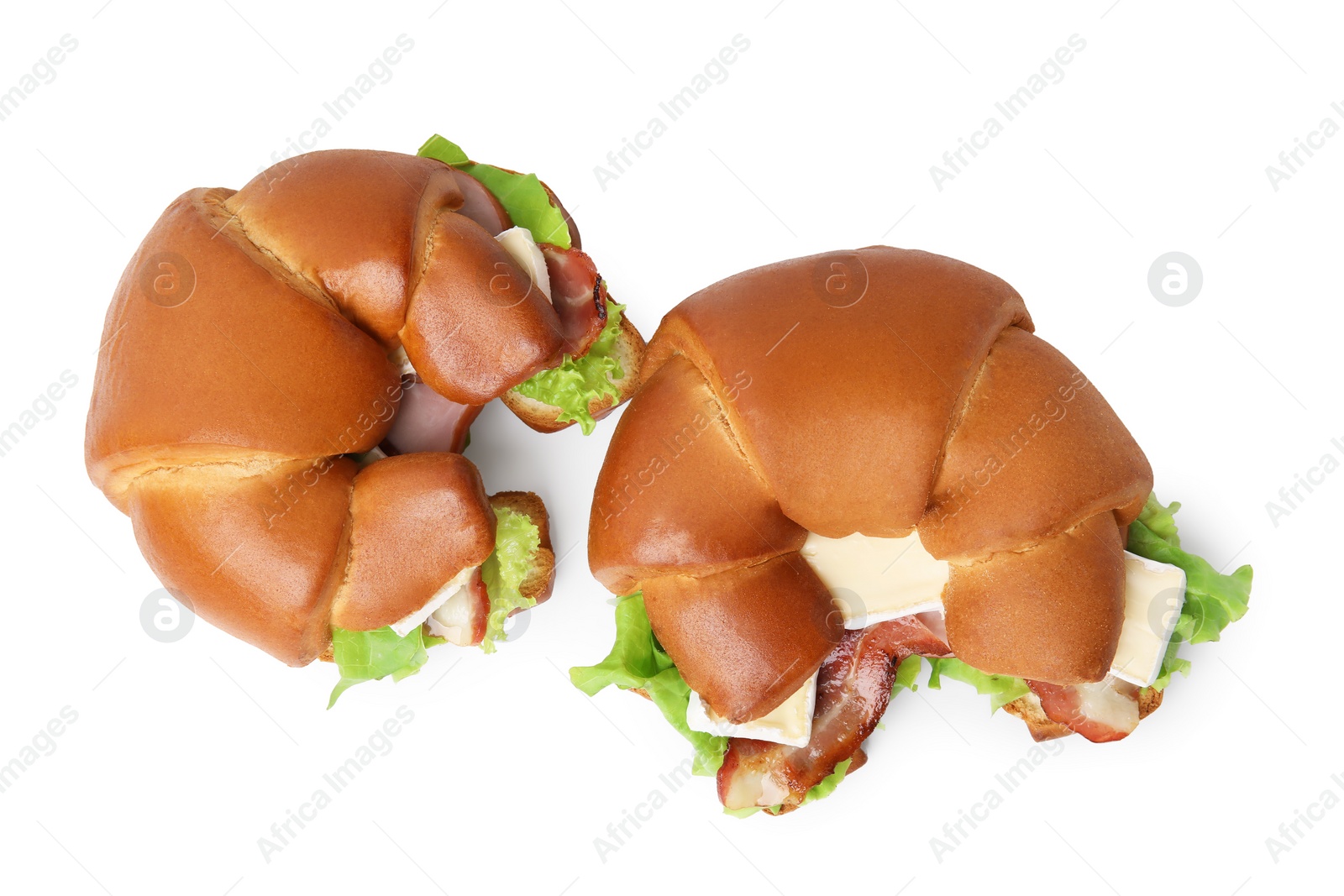 Photo of Tasty crescent rolls with brie cheese, ham and bacon isolated on white, top view