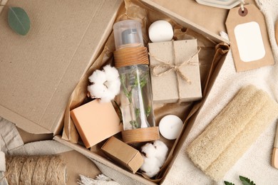Photo of Flat lay composition with eco friendly personal care products on table