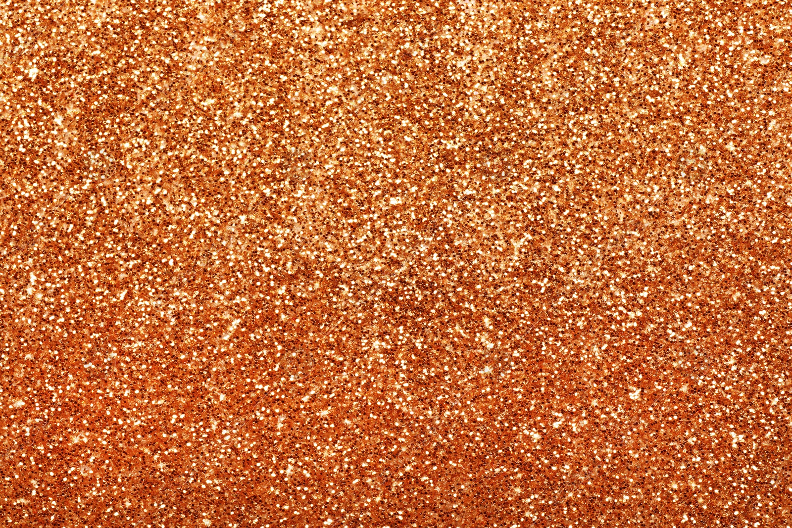 Image of Beautiful shiny orange glitter as background, closeup