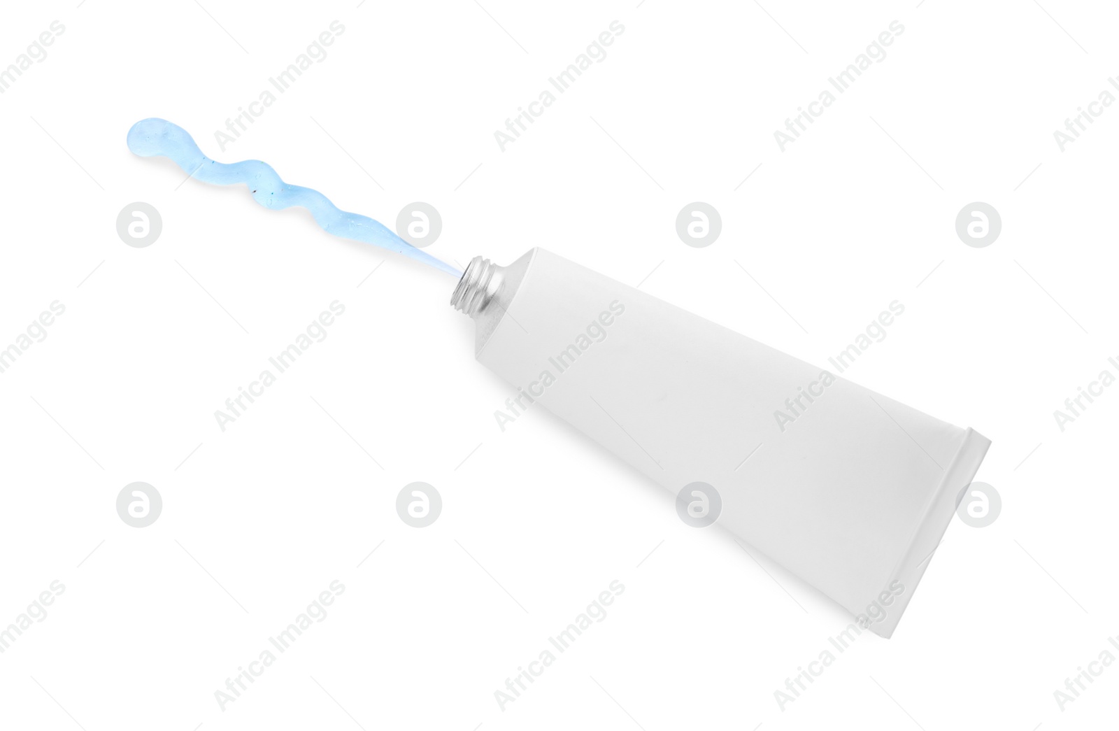 Photo of Open tube with ointment on white background, top view