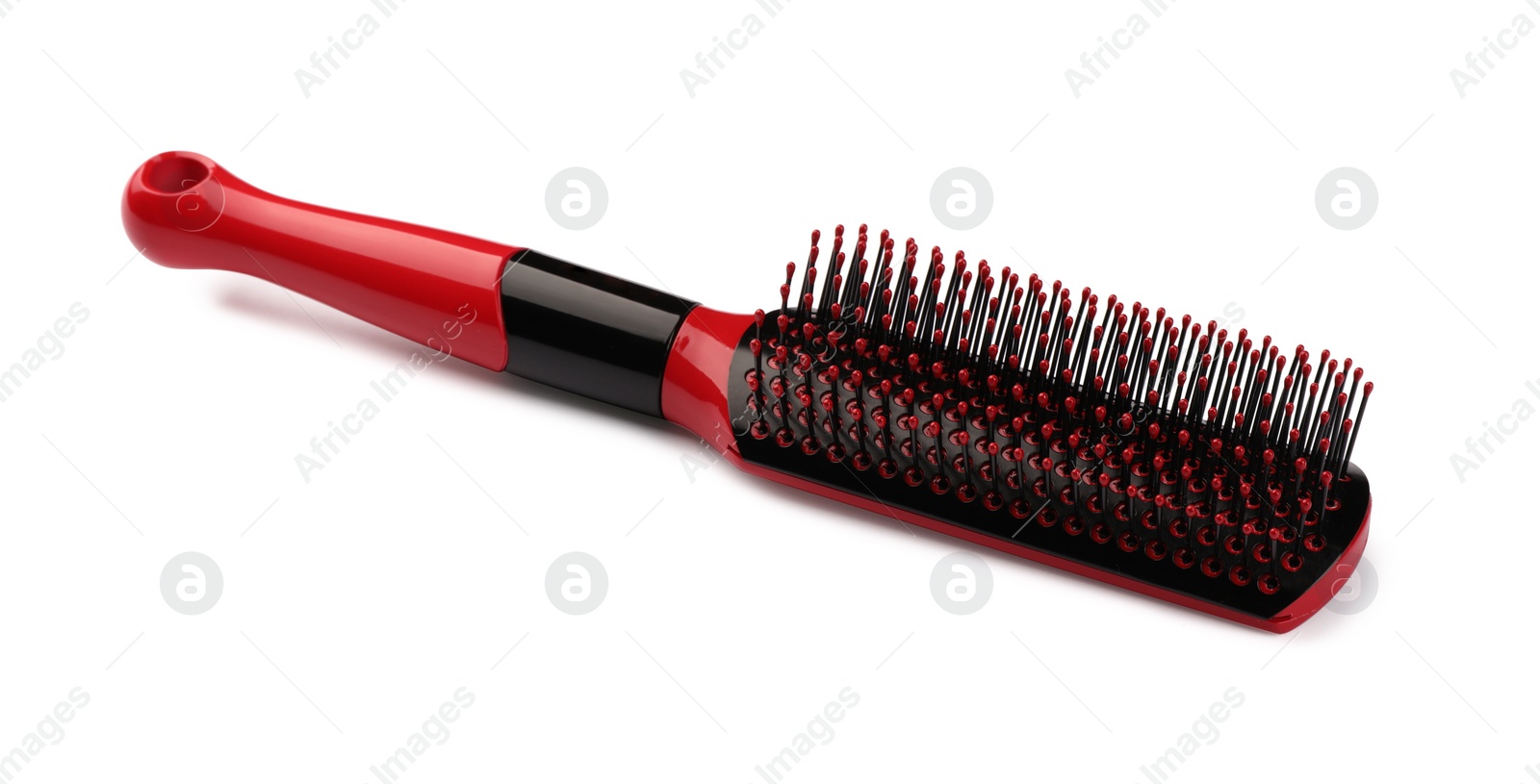 Photo of New modern hair brush isolated on white