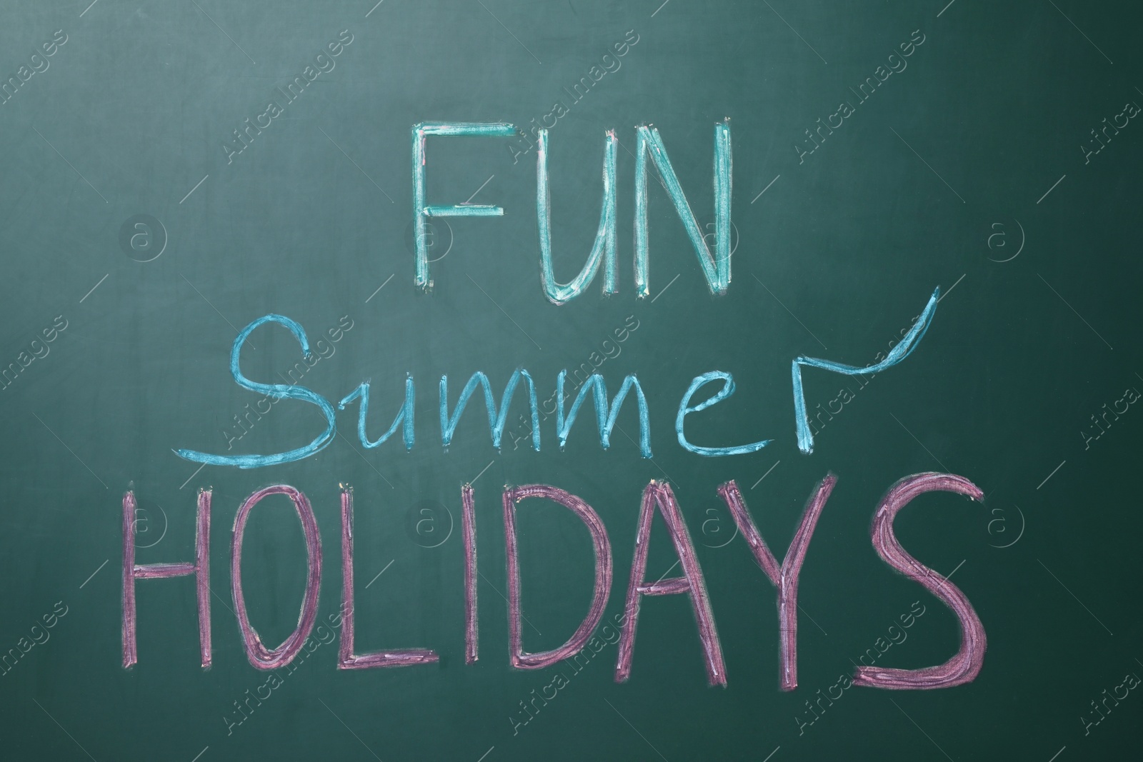 Photo of Text Fun Summer Holidays written on school chalkboard