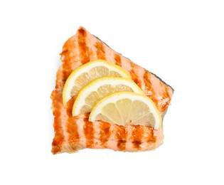 Photo of Tasty grilled salmon with lemon on white background, top view