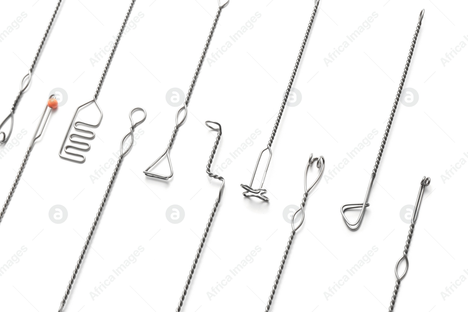 Photo of Set of logopedic probes on white background. Speech therapist's tools