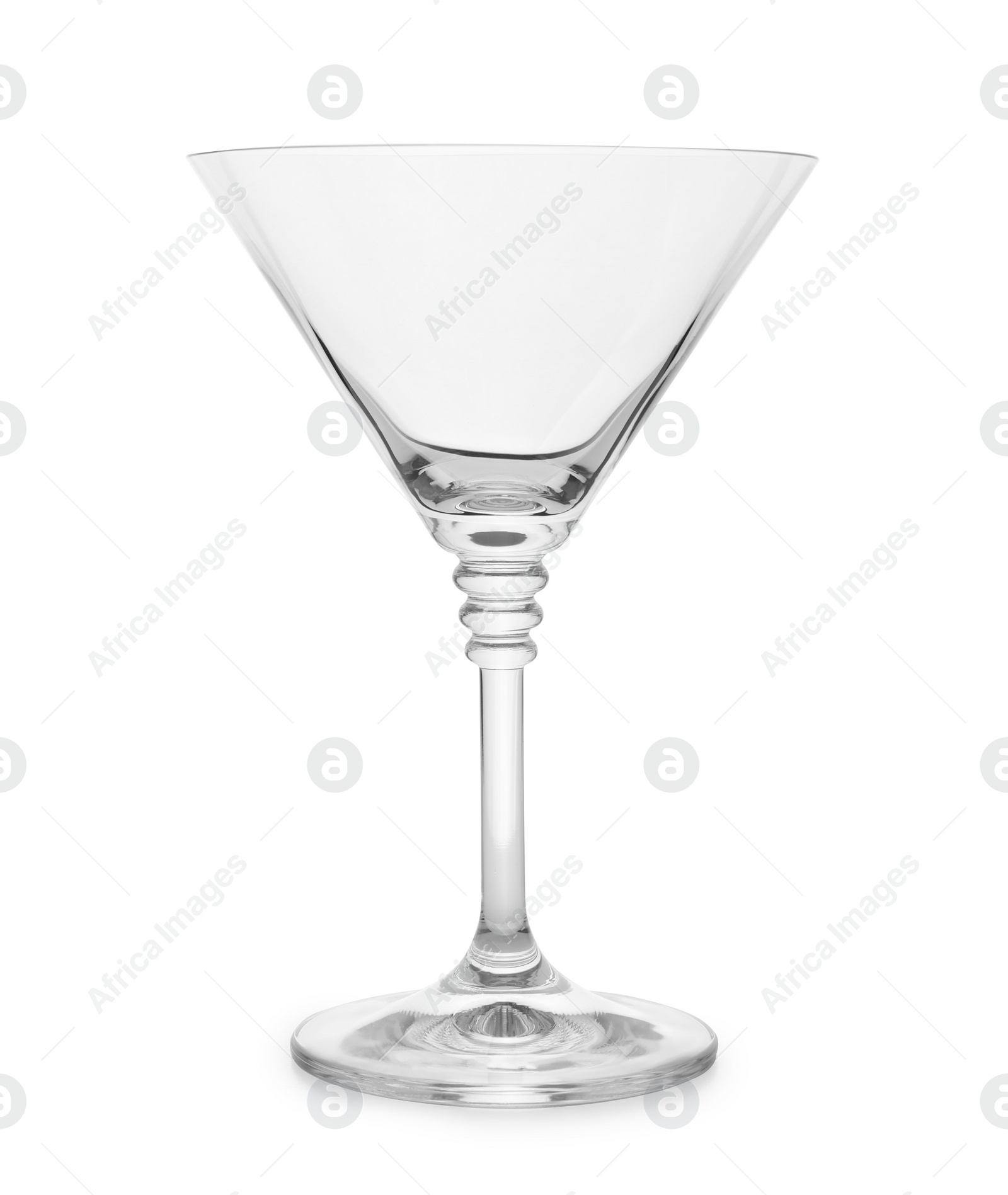 Photo of Empty crystal martini glass on white background