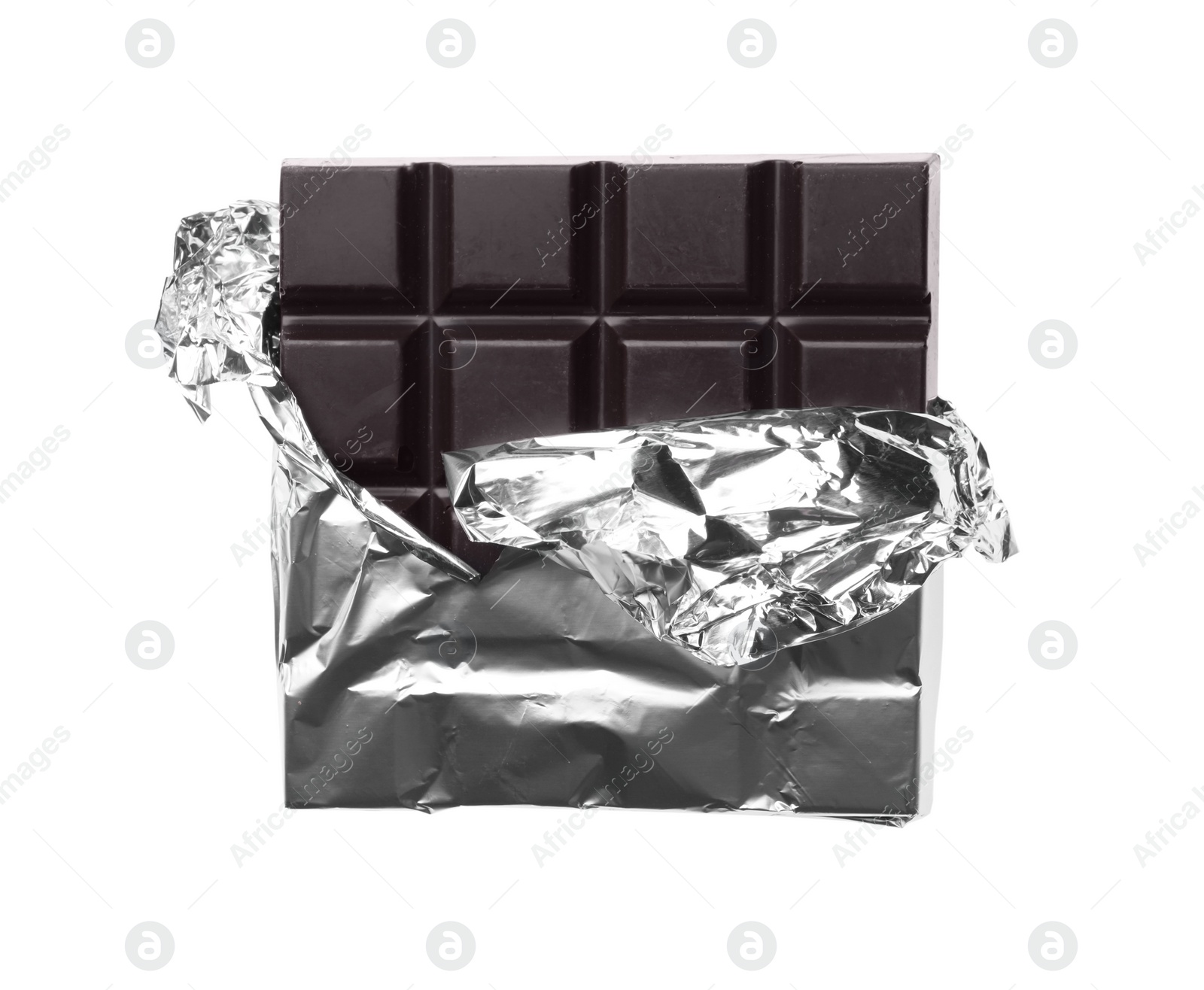 Photo of Delicious dark chocolate bar wrapped in foil isolated on white