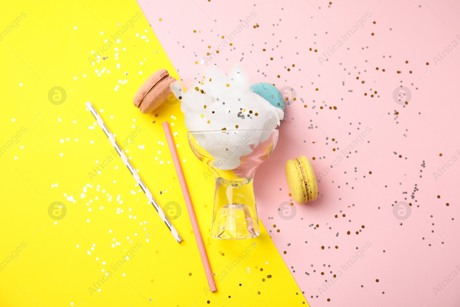 Photo of Flat lay composition with sweet cotton candy on color background