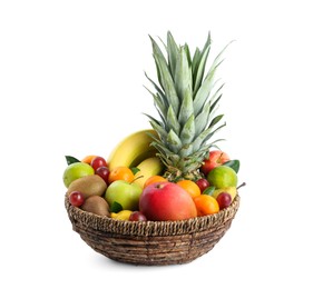 Photo of Assortment of fresh exotic fruits in wicker bowl on white background