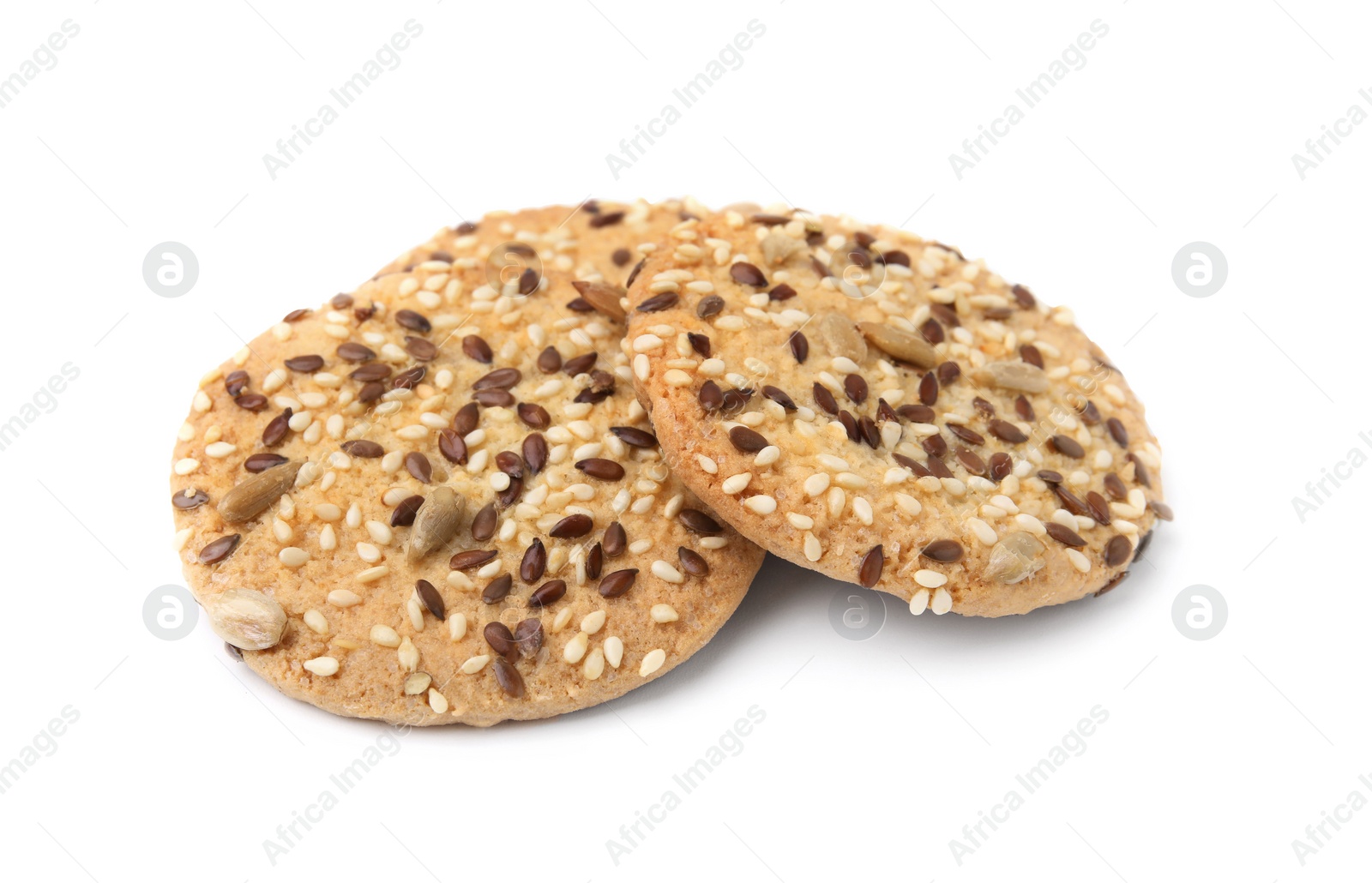 Photo of Round cereal crackers with flax, sunflower and sesame seeds isolated on white