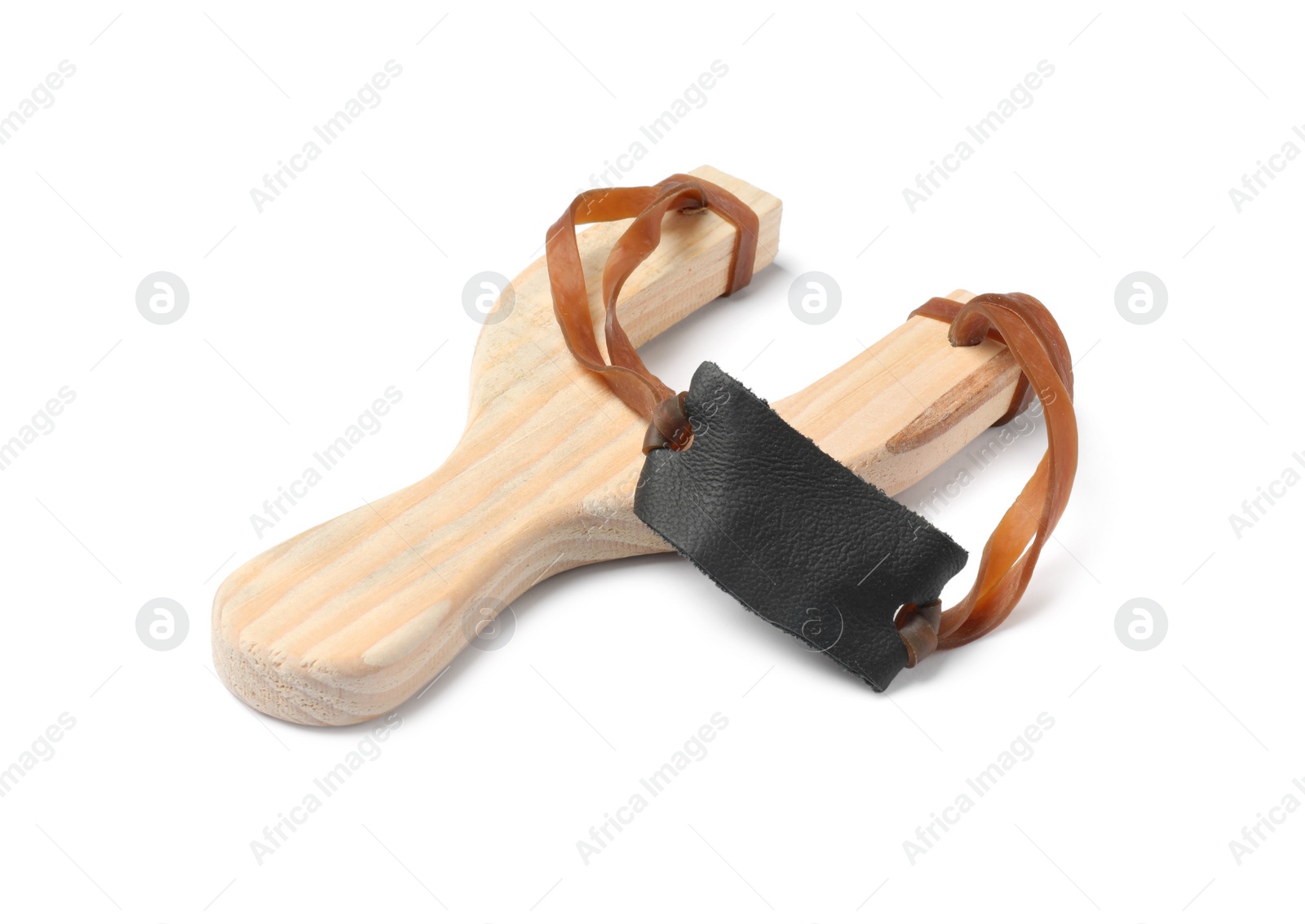 Photo of One wooden slingshot with leather pouch isolated on white