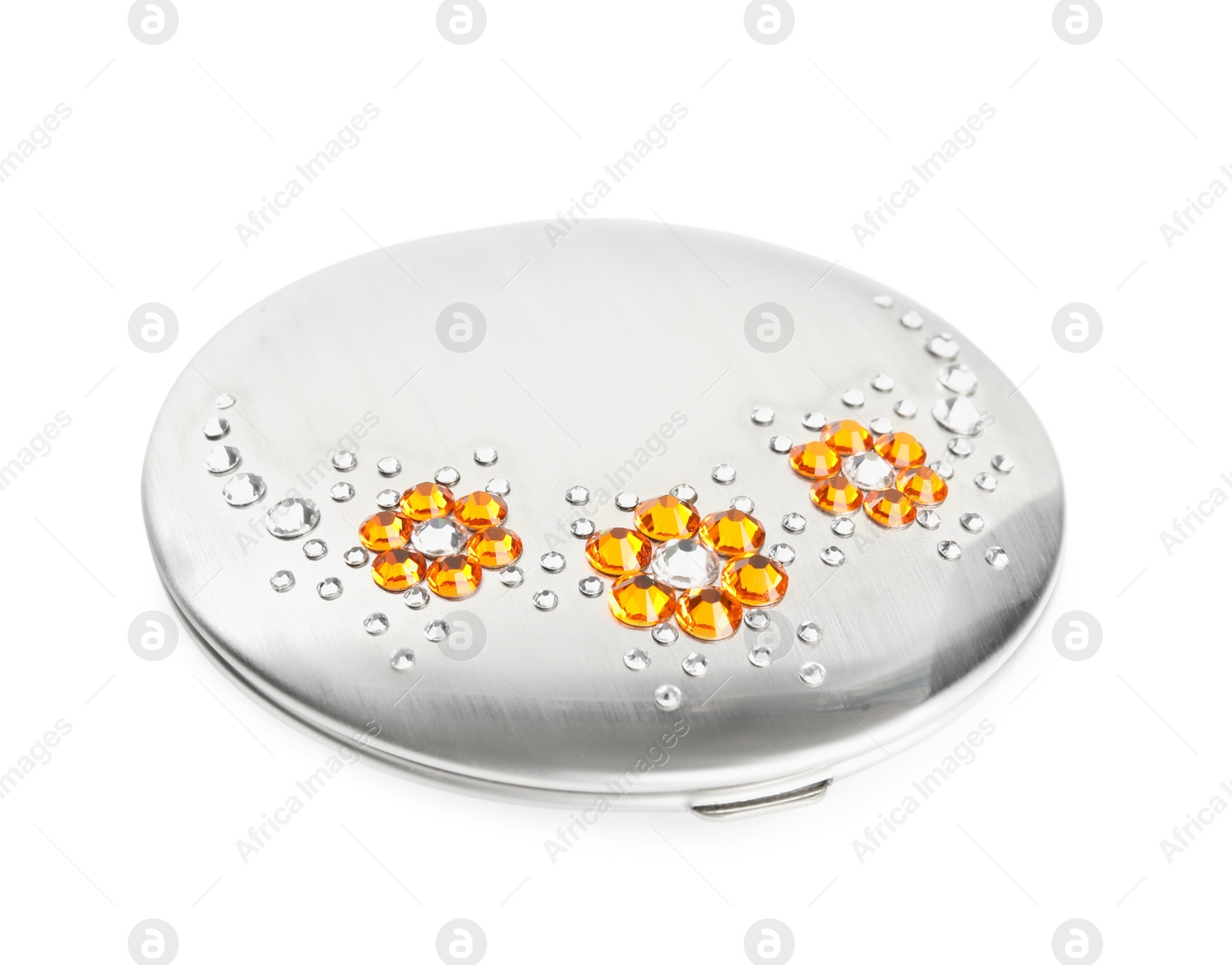 Photo of Silver cosmetic pocket mirror with gemstones isolated on white