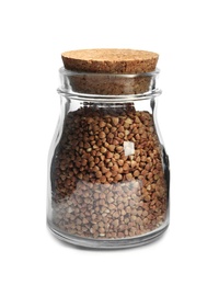 Photo of Jar with uncooked buckwheat on white background